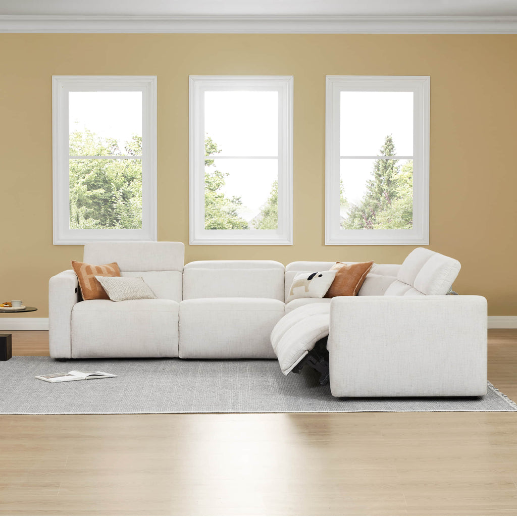 Canapé d'angle inclinable à 5 places Oliver, avec accoudoirs intégrés et appuie-têtes électriques.