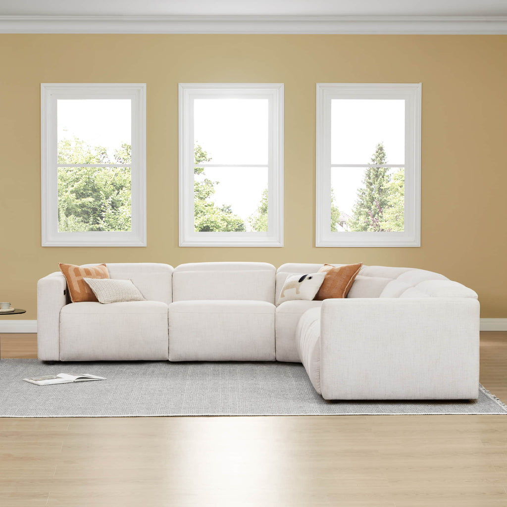 Canapé d'angle inclinable à 5 places Oliver, avec accoudoirs intégrés et appuie-têtes électriques.