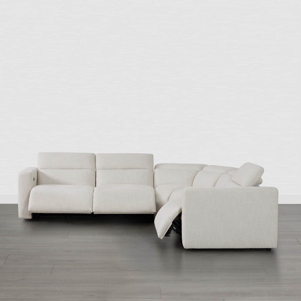 Canapé d'angle inclinable à 5 places Oliver, avec accoudoirs intégrés et appuie-têtes électriques.