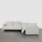 Canapé d'angle inclinable à 5 places Oliver, avec accoudoirs intégrés et appuie-têtes électriques.