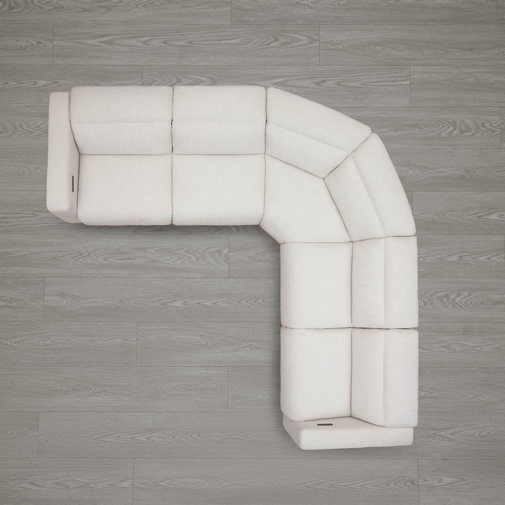 Canapé d'angle inclinable à 5 places Oliver, avec accoudoirs intégrés et appuie-têtes électriques.