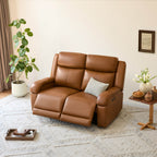 Canapé inclinable électrique Isaac en cuir véritable, avec dossier basculant électrique, pour installation contre un mur.