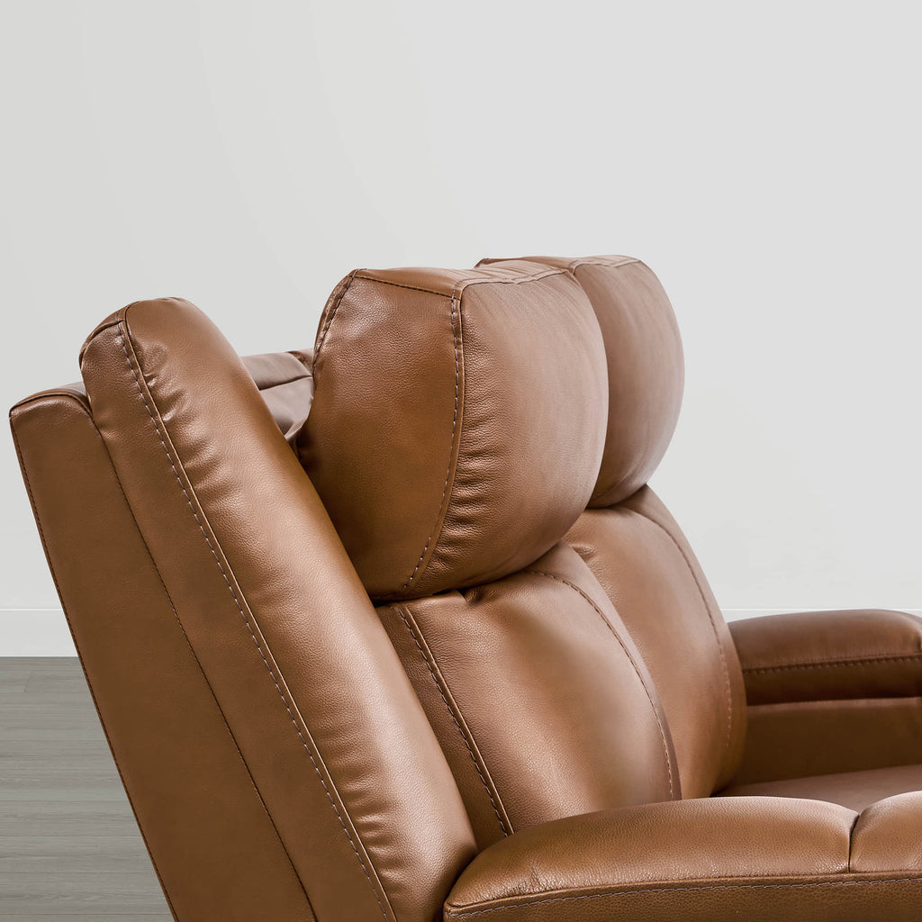 Canapé inclinable électrique Isaac en cuir véritable, avec dossier basculant électrique, pour installation contre un mur.